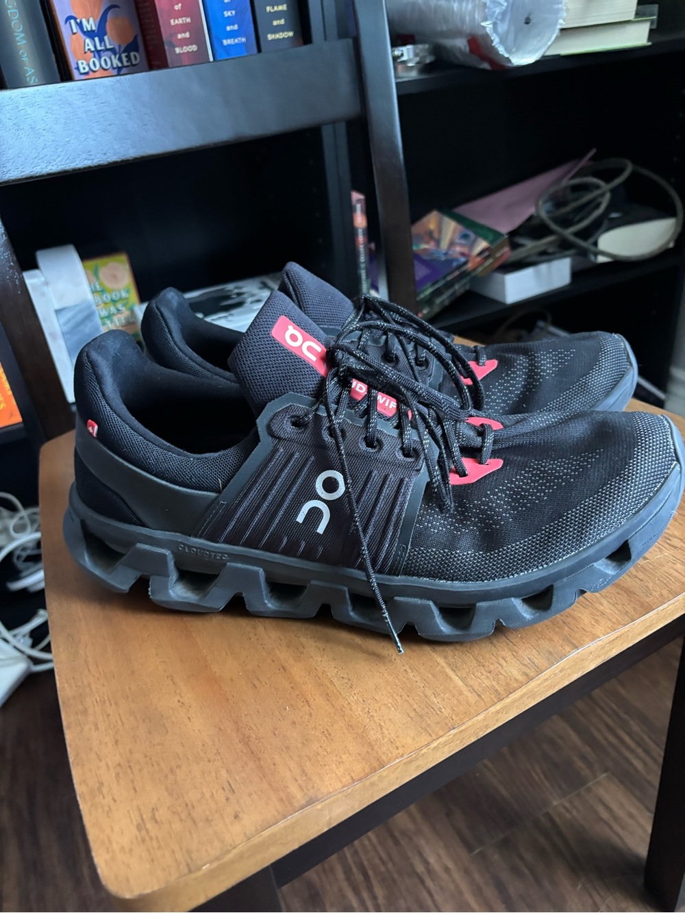 On Running Men's Athletic Shoes in Black with Red Accents